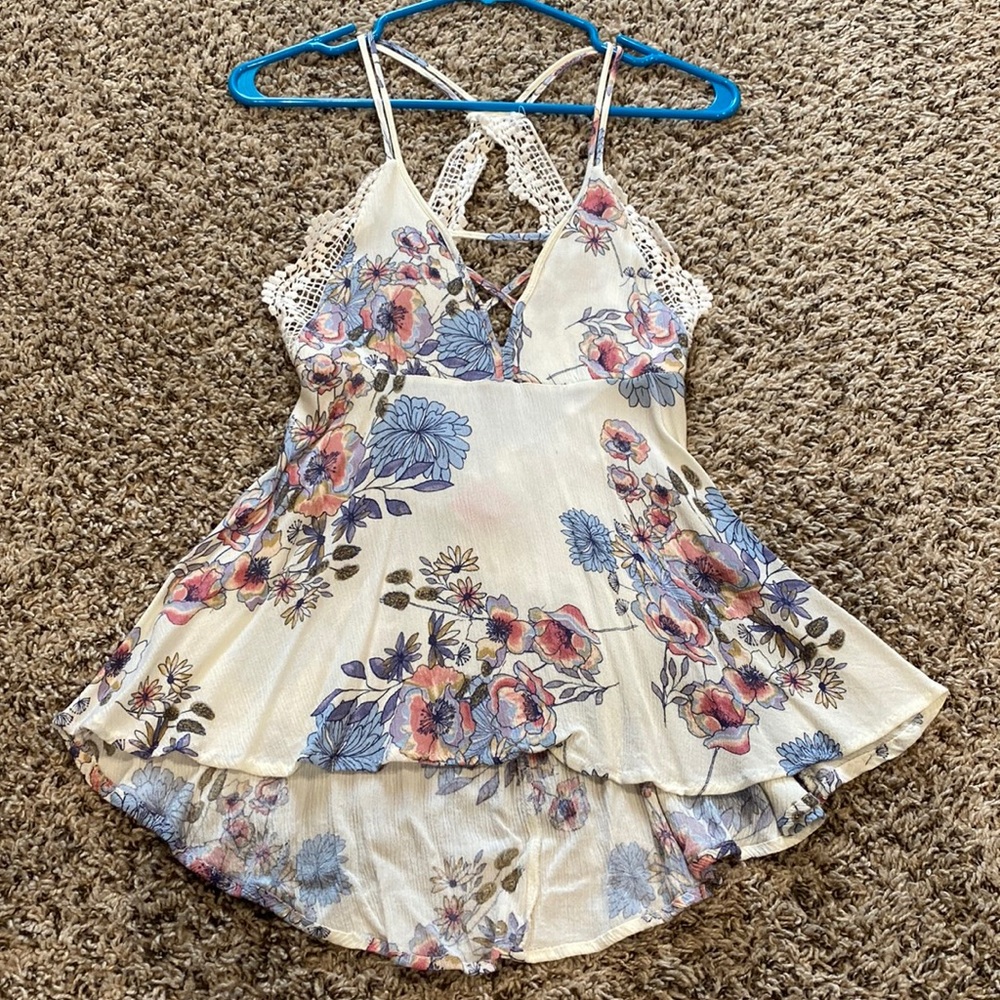 Daytrip super cute floral tank top with open back detail